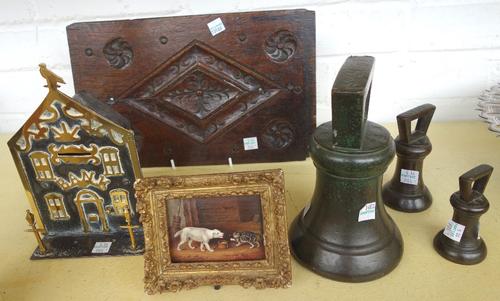 A painted porcelain plaque, late 19th century, depicting a cat and dog fight, in a gesso frame, 9.5cm wide, together with an early Victorian 'Bank' mo