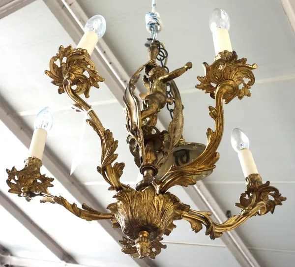 A Louis XV style gilt bronze five branch foliate cast chandelier, with cherub to the centre, 55cm high.