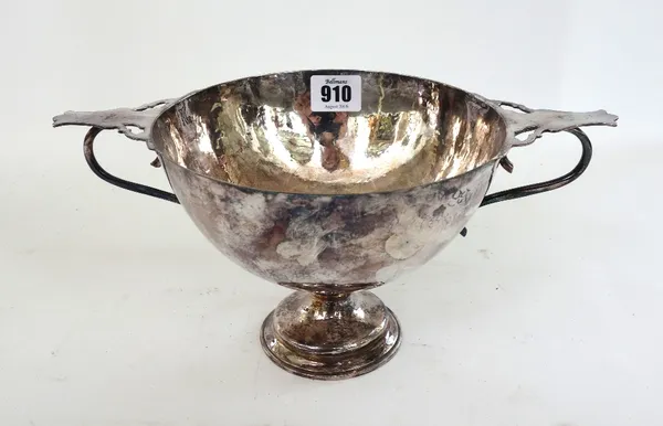 Duchess of Sutherland's Cripples Guild; a collection of silvered copper wares, to include; a twin handled pedestal cup, 28cm diameter, a drainer bowl,