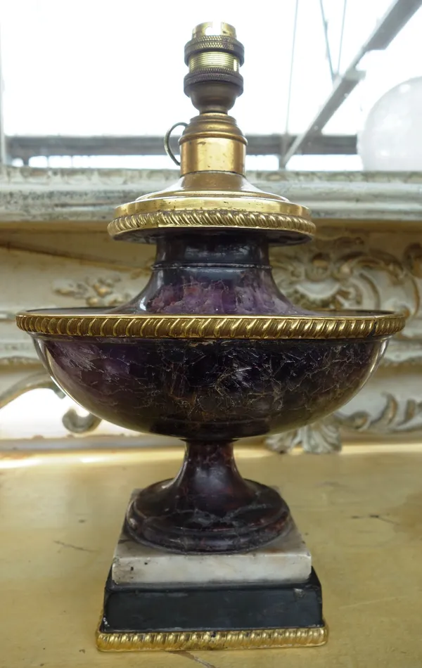 A Derbyshire Blue John table lamp, 19th century, of circular turned form with applied brass embellishments, on a stepped marble base (a.f), 20cm high