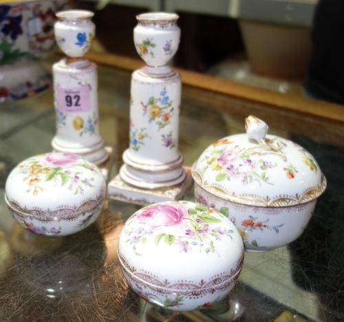 A group of 19th century and later Meissen ceramics, comprising; a pair of circular lidded floral decorated pots, another lidded floral pot and a pair