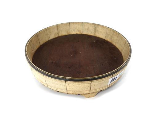 A sectional bone dish, 19th century, of cooper bound construction, with a wooden base and four shaped feet, 29cm diameter.