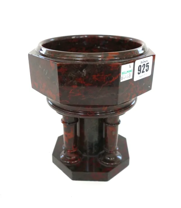 A Victorian Cornish serpentine font, rouge colour of octagonal form, 17cm high.