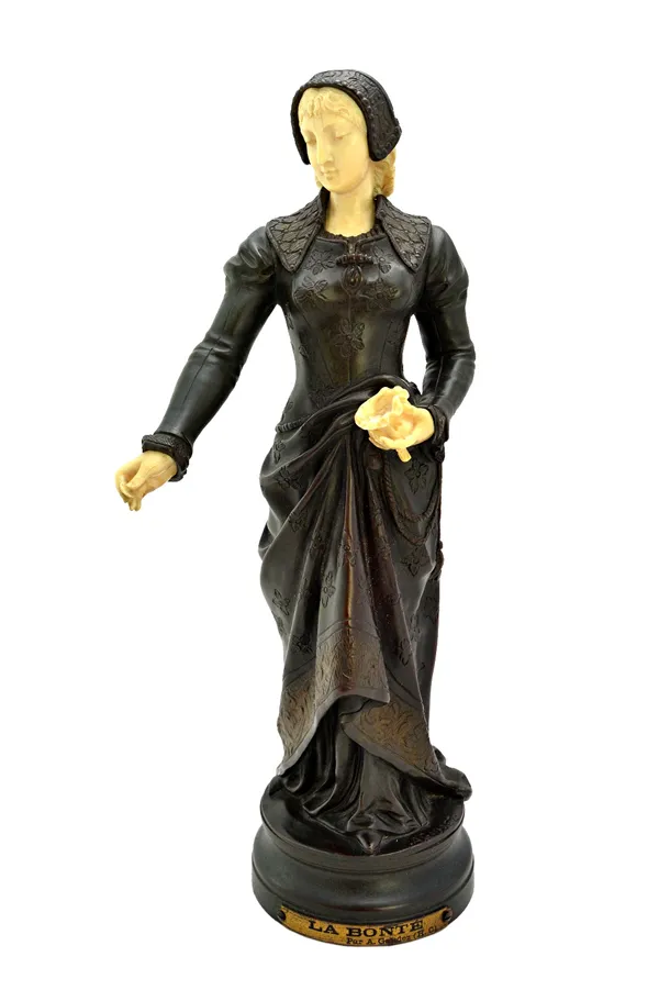 A French bronze and ivory figure entitled 'La Bonte', circa 1900, after Adrien Etienne Gaudez (1845-1902), the figure holding a purse in one hand and