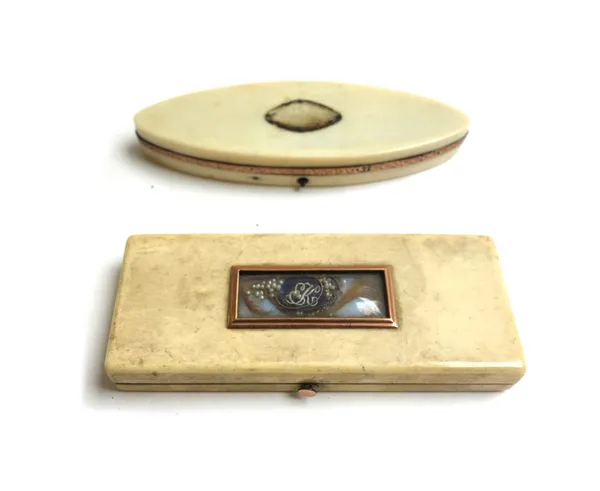 A George III ivory rectangular patch box, with window inclusion to the lid containing an oval monogram and a lock of hair, 9cm wide, and an ivory patc