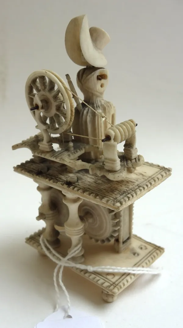 A bone prisoner of war spinning Jenny, 19th century, of typical form (a.f), 10cm high.  63