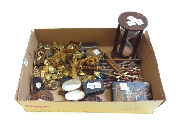 A quantity of small collectables, including; naval brass buttons and gauntlets, wooden and bone bobbins, a wooden framed glass egg timer, an agate snu