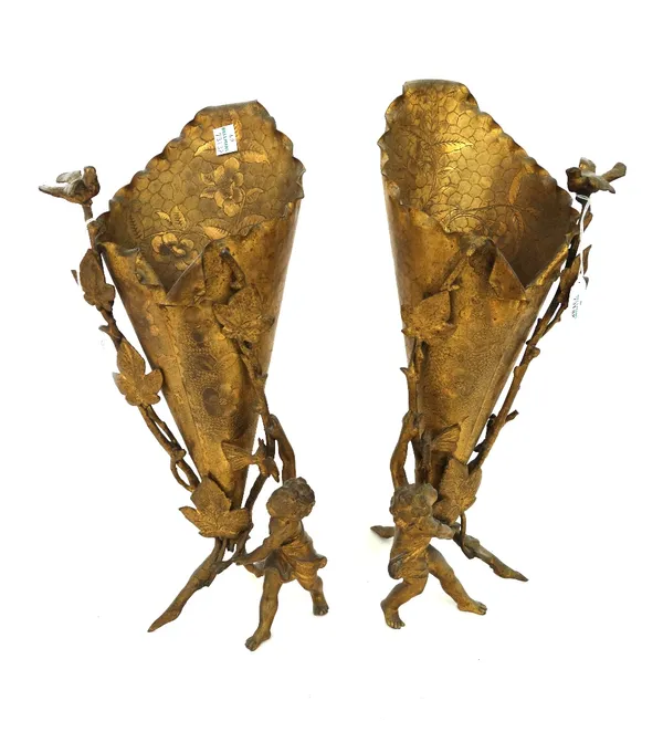 A pair of gilt metal flower stands, late 19th century/early 20th century, cast with figures, flora and fauna, 37.5cm high (2).