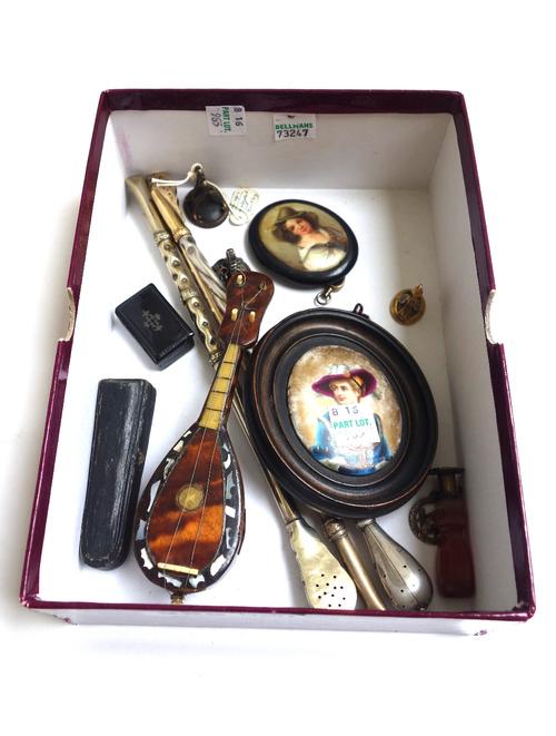 A quantity of small collectables, including; three South American silver mate straws, three hardstone intaglio seals, a silver mounted cheroot, two ov