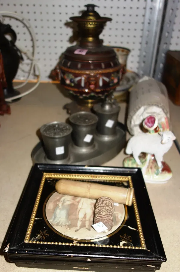 A group of ceramics and collectables, including a Majolica pottery oil lamp, sundry ceramics, a three place pewter table set with an oval tray and a p