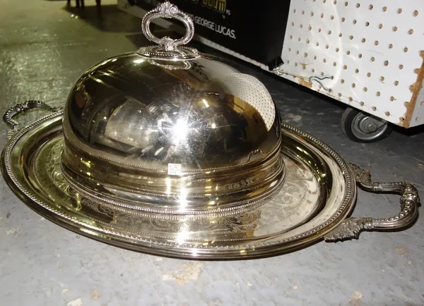 A quantity of silver plate including large meat dome, three piece tea set, two large trays and sundry. (qty)   S2B