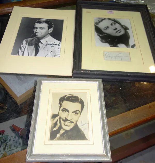A framed and glazed photo of Ingrid Bergman and signature, a mounted photo, signed Jimmy Stewart and a framed signed photo of Cesar Romero. All potent