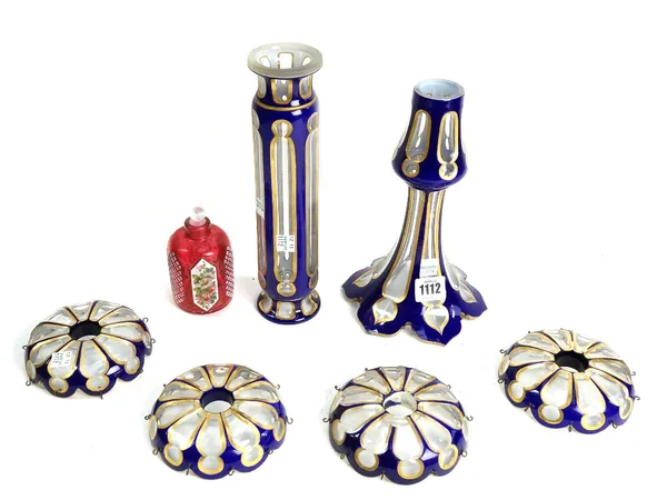 A quantity of parts from a clear and blue glass chandelier, and a cranberry glass scent bottle with foliate decorated enamel panels, 10cm high (7).