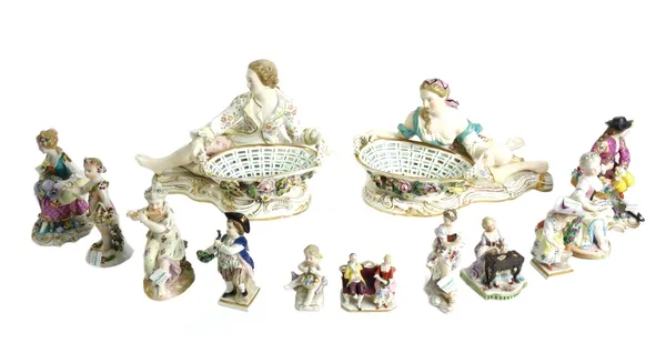 A pair of Meissen style porcelain figural sweetmeat baskets, 20th century, modelled as a gallant and companion atop a gilt C scroll base, 27cm wide, a