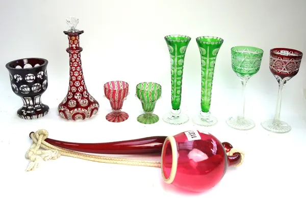 A ruby glass pipe of large proportions, circa 1880, 47cm long, and a group of coloured and cut Bohemian glass including; a pair of bud vases, 22cm hig