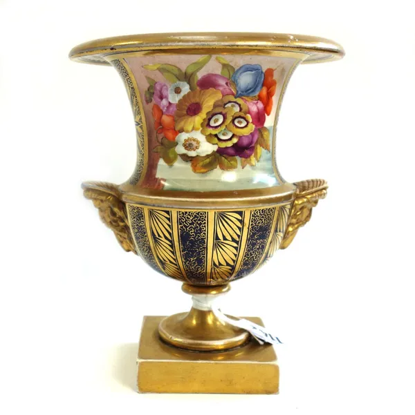 A Miles Mason porcelain two handled vase of urn form, circa 1810, painted with still life fruit and flowers against a gilt blue ground, impressed 'M.