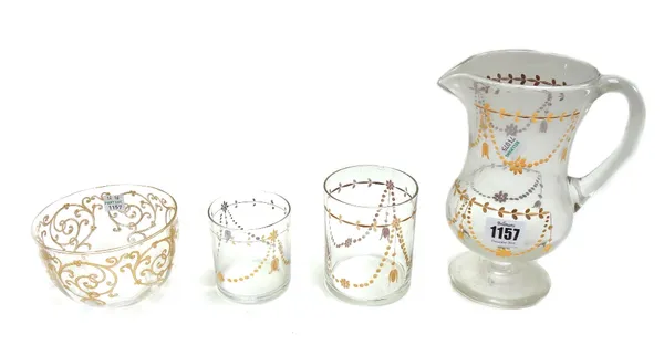 A part suite of gilt engraved drinking glasses, 20th century, comprising; a footed jug (19.5cm high), ten tumblers (9cm high), twenty seven smaller tu