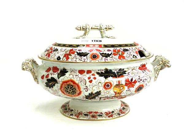 An Ironstone china part dinner service, 19th century, decorated in an Imari pattern, comprising; an oval platter, 39cm wide, a two handled oval dish,