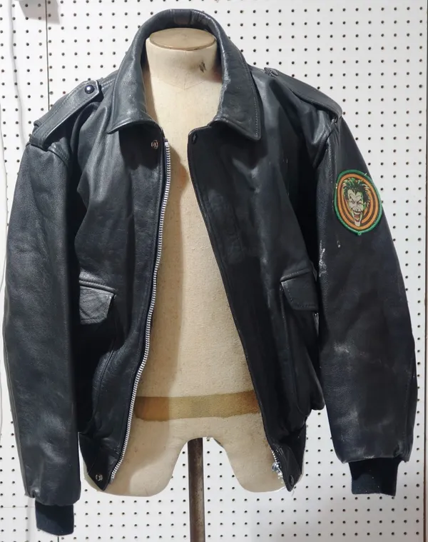 A promotional black leather crew bomber jacket with Batman patch on reverse and Joker Patch on arm, from the Tim Burton 'Batman' film 1989