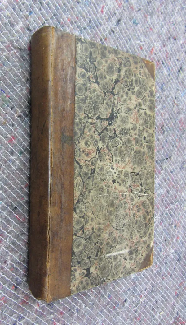 [BASKETT, J.]  History of the Island of St. Domingo  . . .  First Edition. folded table; old half leather & marbled boards. 1818.