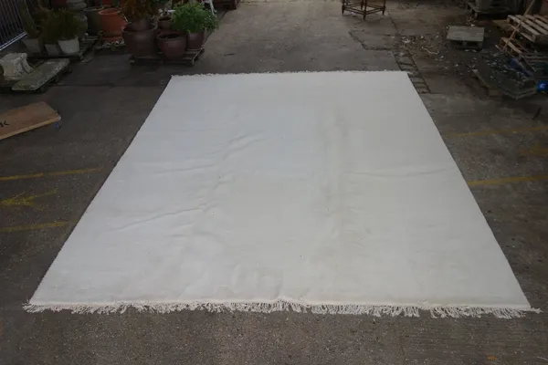 A large modern white Liberty of London carpet.  Extra