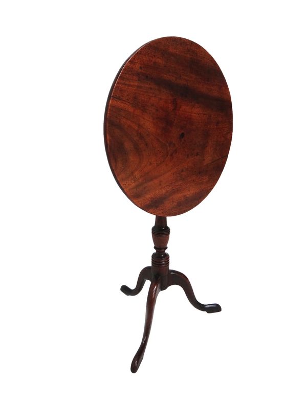 A George III miniature mahogany circular snap top tripod table, 33cm wide.  Illustrated