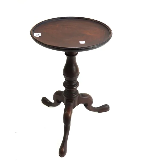A 19th century mahogany tripod kettle stand, of 18th century style, with dished circular top and baluster framed column, 46cm high.
