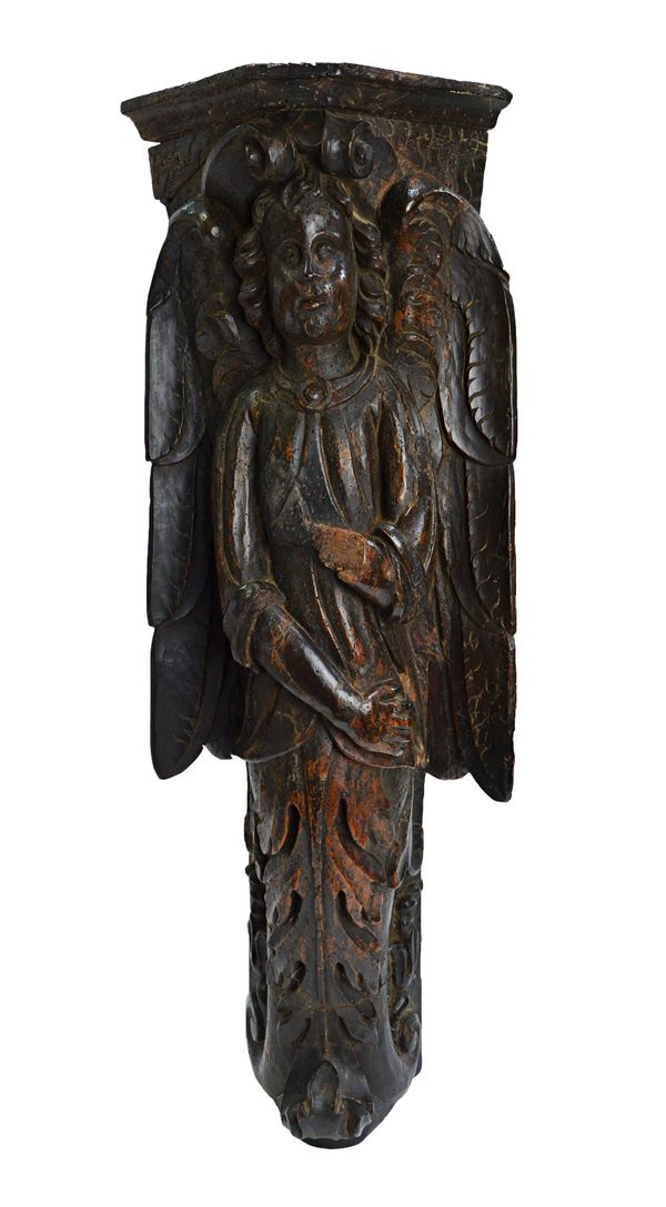 A large 18th century Continental carved walnut figure of an angel on an acanthus scroll, 72cm h. Illustrated