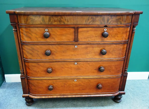 A Victorian mahogany bowfront chest, with flush fit frieze drawer over two short and three long graduated drawers, flanked by turned columns, 132cm wi