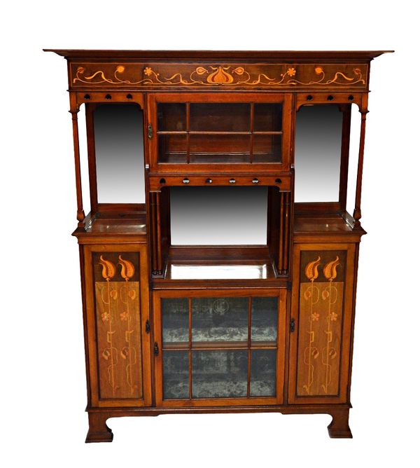 An Art Nouveau marquetry inlaid mahogany display cabinet/cupboard, with an arrangement of cupboards, on bracket feet, 147cm wide x 191cm high.  Illust