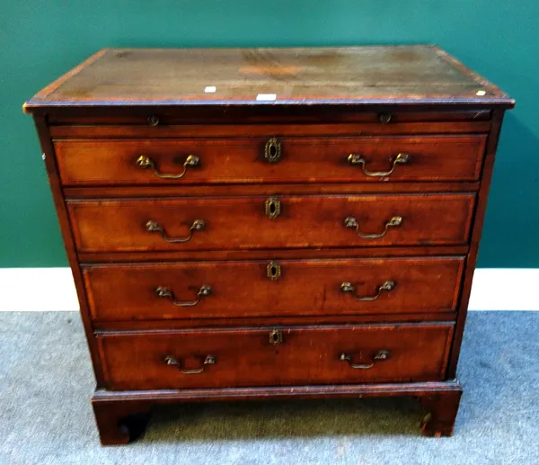 An 18th century and later inlaid mahogany chest, the brushing slide over four long graduated drawers, on bracket feet, 84cm wide.