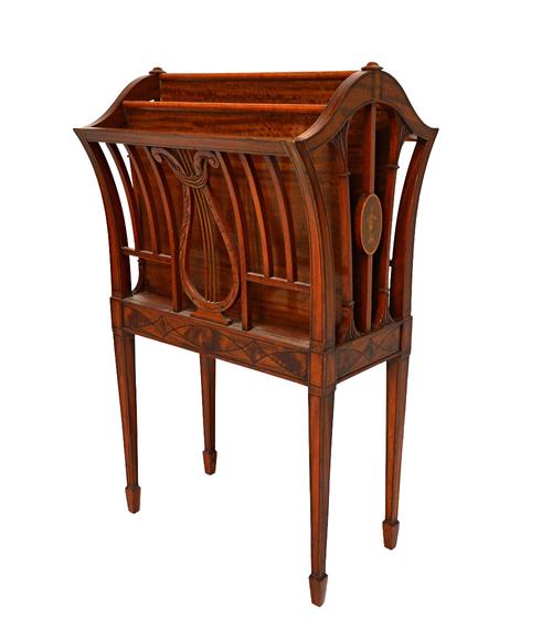 An Edwardian marquetry inlaid satinwood Canterbury, the outswept four division top with lyre mounts, on tapering square supports, 45cm wide.  Illustra