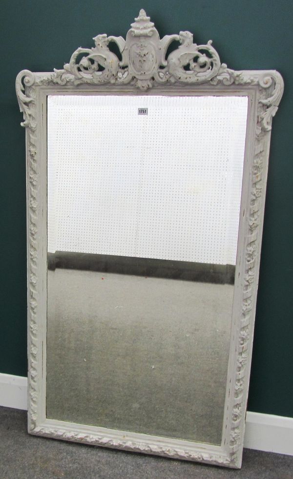 A 19th century later grey painted mirror, with cartouche crest and floral chased frame, 85cm wide x 152cm high.