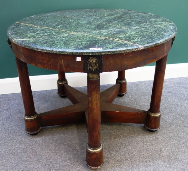 An Empire style centre table, the circular marble top over gilt metal mounted mahogany base, with five turned supports united by stretcher, 95cm wide.