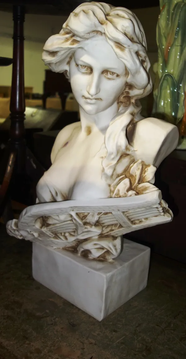 A faux marble bust of a female, 64cm high.   H5