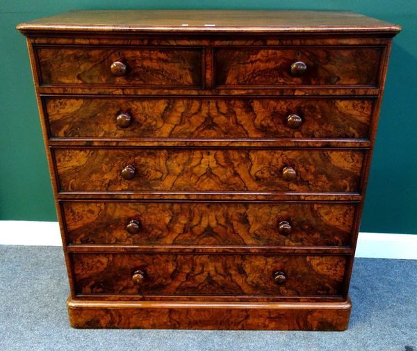 A Victorian burr walnut chest of two short and four long graduated drawers, on plinth base, 122cm wide.