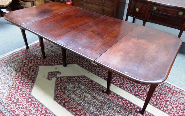 An 18th century style mahogany D end extending dining table, on eight tapering square supports, to include two extra leaves, 122cm wide x 249cm long f