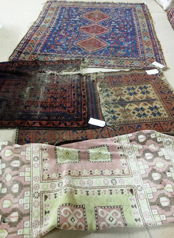 Two Beluchistan rugs, a machine made cotton rug and a Khamseh rug (4).   C8