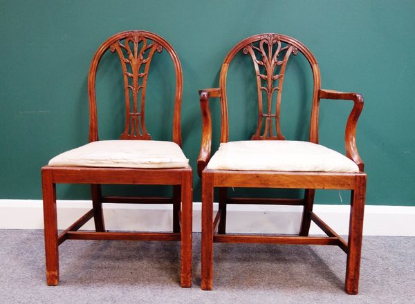 A set of eight George III style mahogany hoop back dining chairs, on canted square supports, to include a pair of carvers (8).