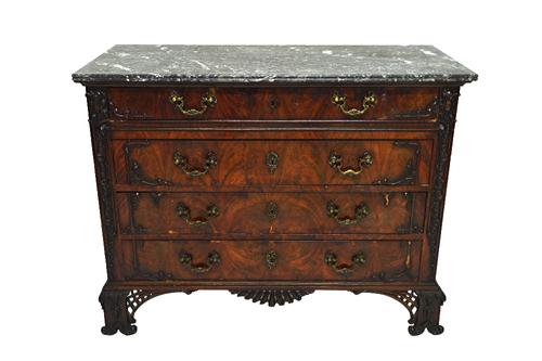 A 19th century French commode, the rectangular grey marble top over carved mahogany base of four long drawers, on pierced bracket feet, 120cm wide.  I
