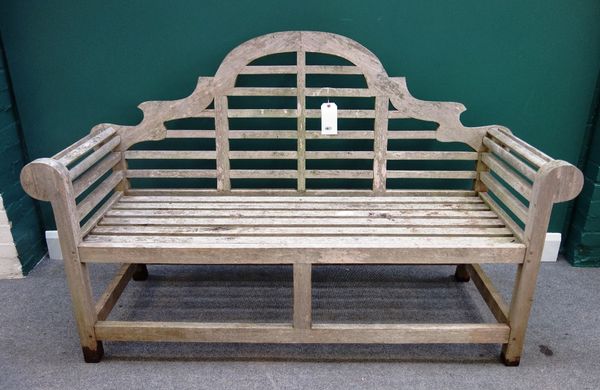 A hardwood bench of Lutyens design, 164cm wide.