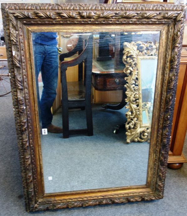 A 19th century gilt framed rectangular wall mirror, with acanthus chased frame and bevelled plate, 115cm wide x 86cm high.