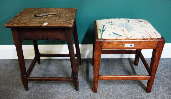 A George III elm stool on tapering square supports, 39cm wide, together with an oak stool on canted square supports, 38cm wide (2).