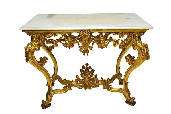 An 18th century style console table, the rectangular white marble top on an extensively pierced and carved giltwood base centred by a cherub face mask