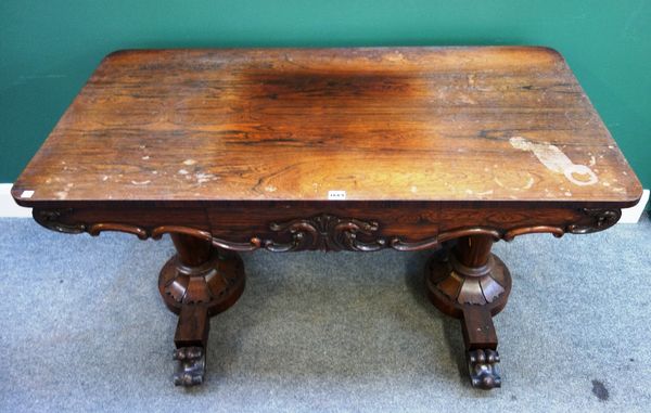 A William IV rosewood centre table, the shaped frieze with single drawer, on pair of tapering octagonal supports, 122cm wide.