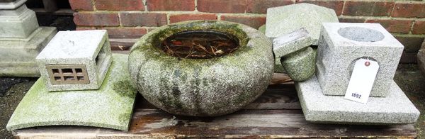 Two Japanese carved granite lanterns, each approximately 92cm high, together with a carved granite roundel and various.