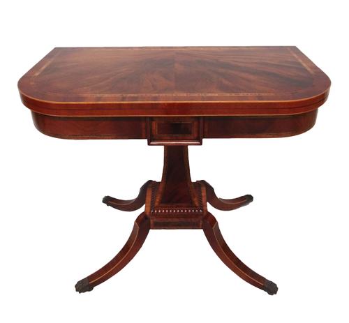 After William Trotter; an 18th century style king wood banded mahogany card table, the fold out D shaped top on a waisted square column and four downs