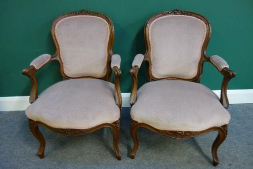 A pair of Louise XV style fauteuils, with open arms and serpentine seats, (2).