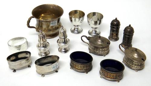Silver, comprising; a six piece condiment set, comprising; a pair of mustard pots, a pair of salts and a pair of pepperettes, each having pierced deco