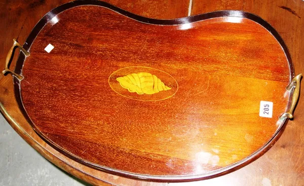 A mahogany kidney shaped tray.   E7